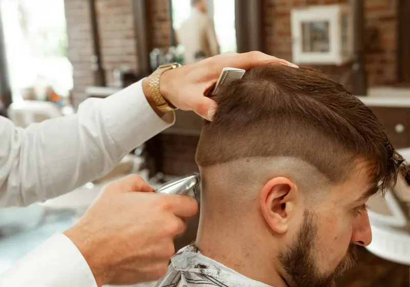 A barber giving a haircut